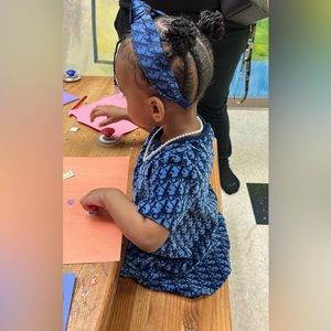 Blue, velvet material Dior dress and headband for little girls.